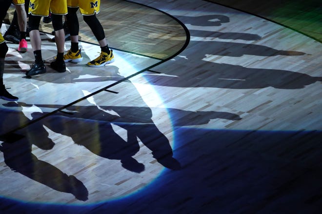 Michigan players are announced before a game against Florida State during the Sweet Sixteen round of the 2021 NCAA Tournament on Sunday, March 28, 2021, at Bankers Life Fieldhouse in Indianapolis, Ind.