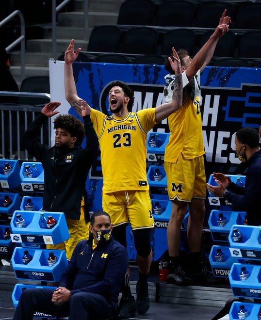 Michigan Wolverines forward Brandon Johns Jr. (23) celebrates after defeating Florida State during the Sweet Sixteen round of the 2021 NCAA Tournament on Sunday, March 28, 2021, at Bankers Life Fieldhouse in Indianapolis, Ind.